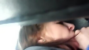 Lewd Girlfriend Gives A Blowjob In A Car