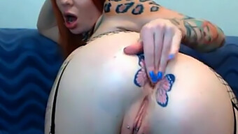 Inked Redhead Reveals More Butterfly Design On Webcam