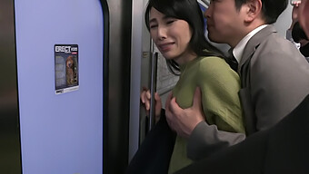 Asian Milf Enjoys Public Train Ride With Handjob